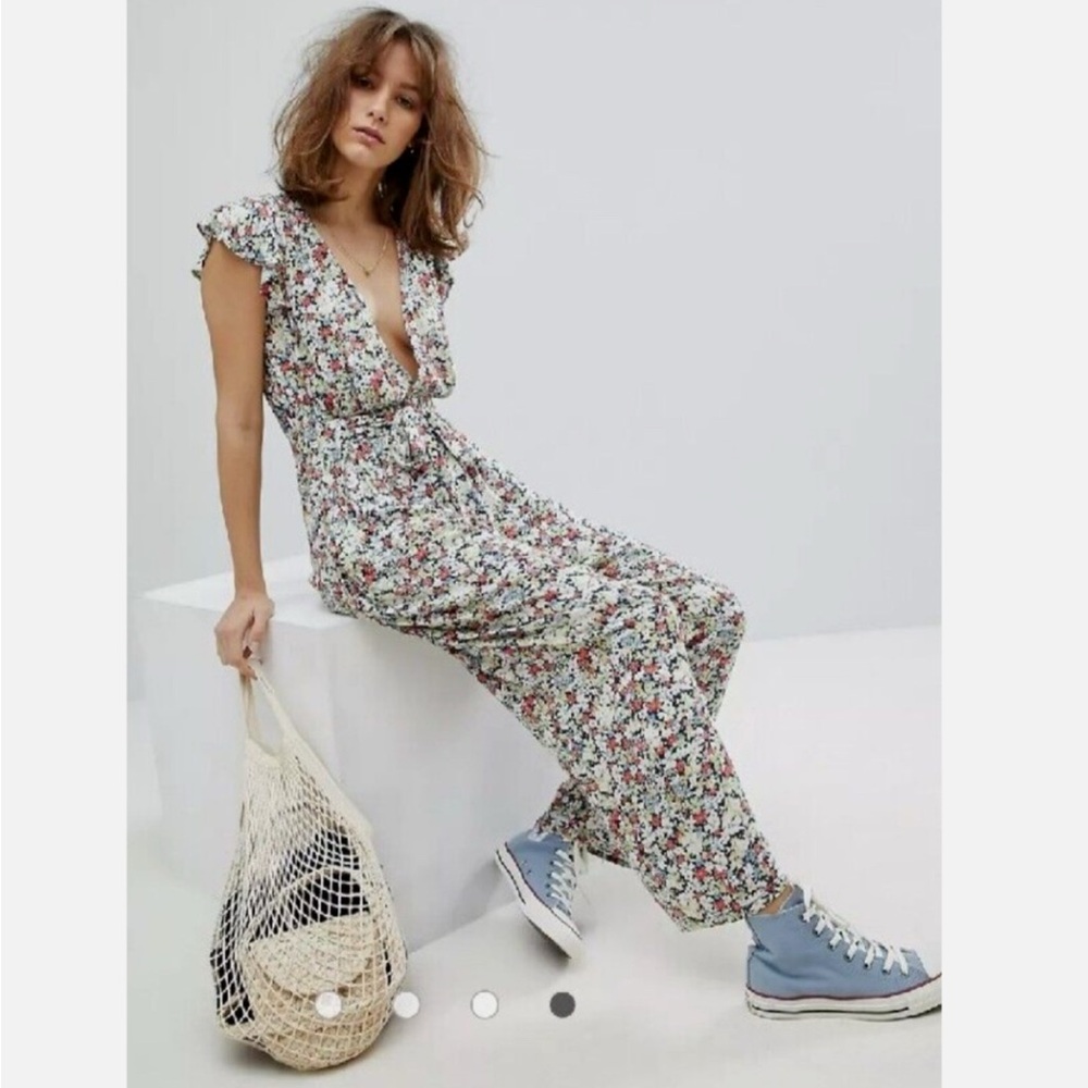 Free People White Jumpsuit with Flutter Sleeves and Wide-Leg Design